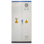 Tall white electrical cabinet with blue top, two yellow electrical hazard warning labels, ventilation grilles, two green indi