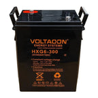 Voltacon HXG6-300 6V sealed lead battery with carry handles, front view product shot against white background.