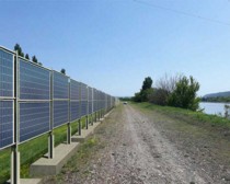Solar panels vertically mounted on fence
